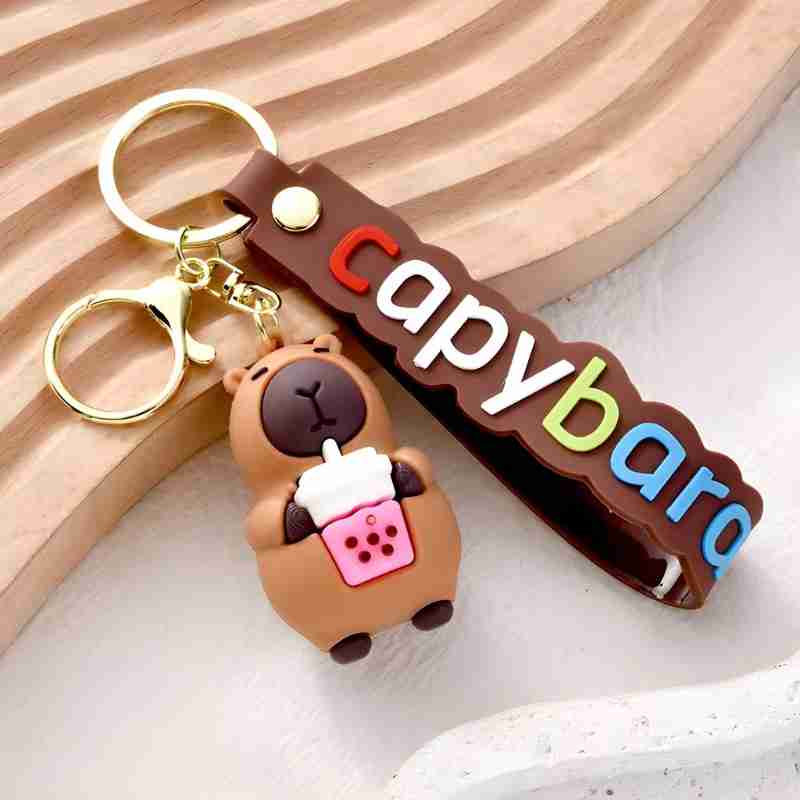 639594-MLV95356176669_102025 Llavero Figura Pvc Capibara Bubble Tea