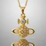 Collar Dorado Saturno Estrellas Nana Vivienne Wetswood